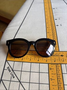Mario Hernandez Black Round Women’s Sunglasses with Brown Lenses, amber temple